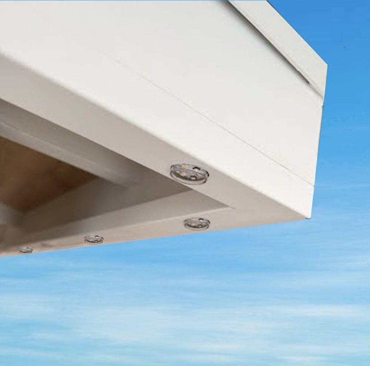 LED nodes in a white fascia track, daytime