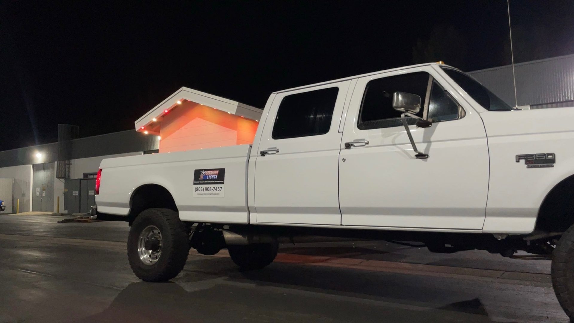Permanent Lights F-350 with demo roof in the bed